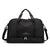 Sac de voyage noir avec la marque "MANLY" et la phrase "TAKE YOU TO SEE THE WORLD".