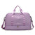 Sac de voyage violet avec la marque "MANLY TAKE YOU TO SEE THE WORLD"