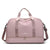 Sac de sport rose avec la marque MANIY et le slogan "Take you to see the world".