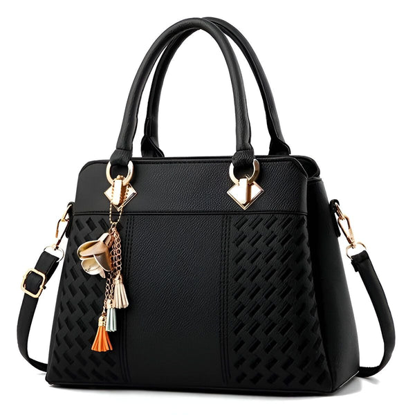 Sac à main noir avec bandoulière, motif sur les côtés et breloque pompons et fleur., 46193874075872,46193874108640,46193874141408,46193874174176,46193874206944,46193874239712
