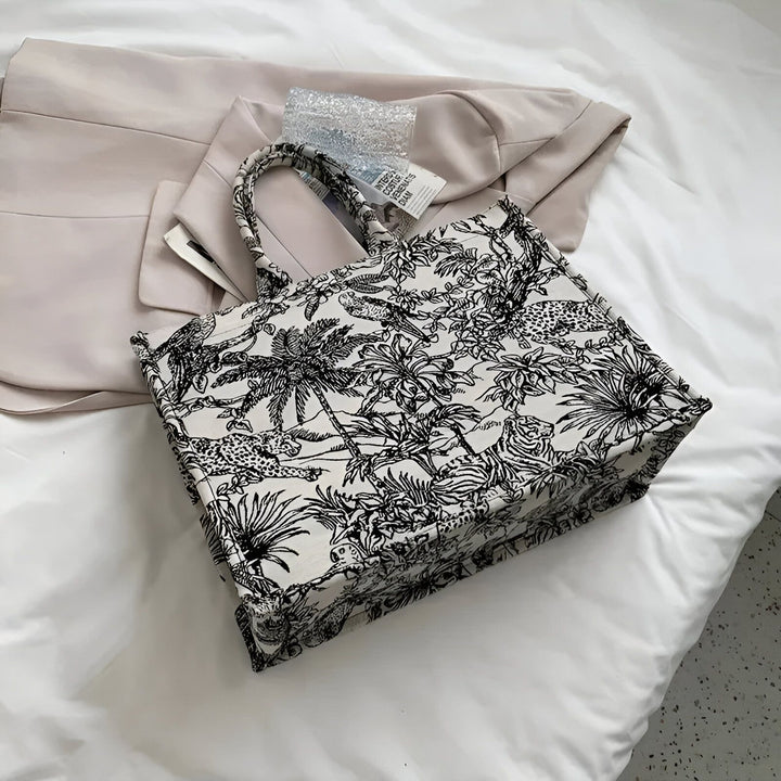 Sac tote noir et blanc avec motifs de léopards, tigres et palmiers., 46193944953056,46193944985824,46193945018592