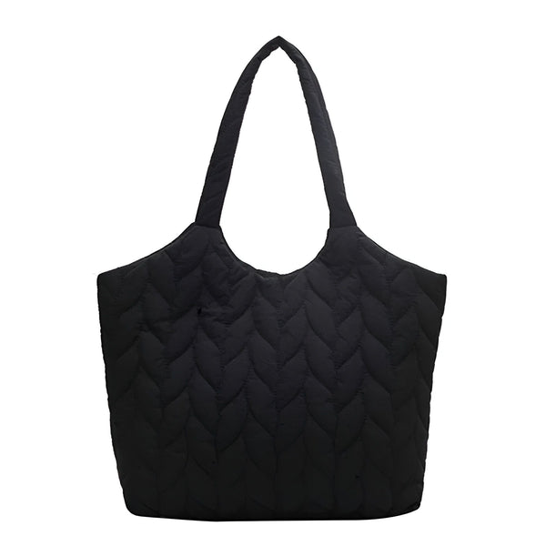 Sac cabas noir matelassé avec un motif de plumes, isolé sur fond blanc., 46194049712352,46194049745120,46194049777888,46194049810656