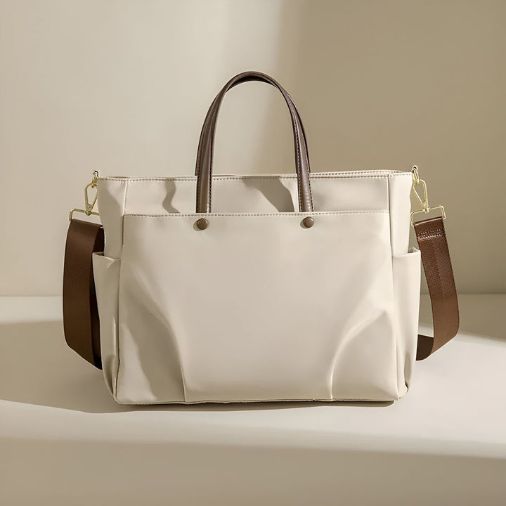 Sac cabas beige clair avec anses en cuir marron et bandoulière en tissu marron., 46193952915680,46193952948448,46193952981216,46193953013984