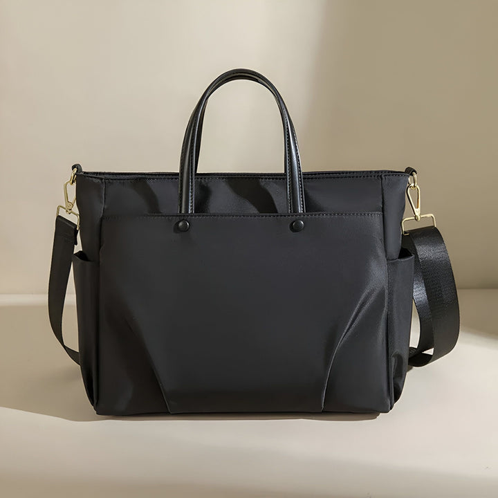 Sac fourre-tout noir avec poignées, bandoulière et poches latérales., 46193952915680,46193952948448,46193952981216,46193953013984