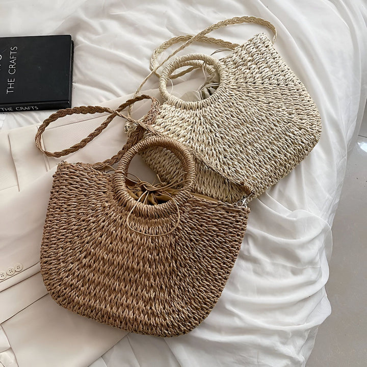 Deux sacs fourre-tout en paille tressée, un beige clair et un marron, avec anses rondes et bretelles., 46194029854944,46194029887712