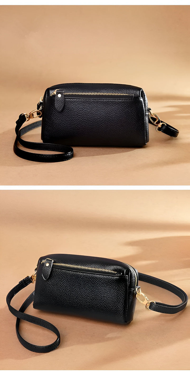 Pochette noire en cuir grainé avec zip doré et dragonne, 46266441924832,46266441957600,46266441990368