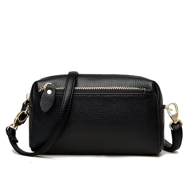 Sac bandoulière noir en cuir grainé avec fermetures éclair dorées, 46266441924832,46266441957600,46266441990368