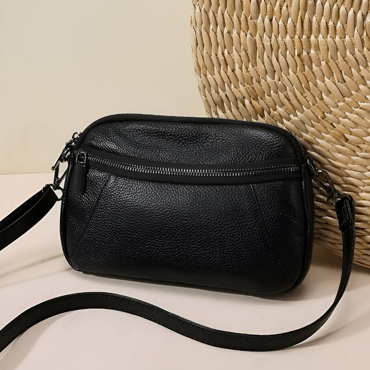 Sac bandoulière en cuir noir texturé avec fermetures éclair, 46264208556256,46264208589024