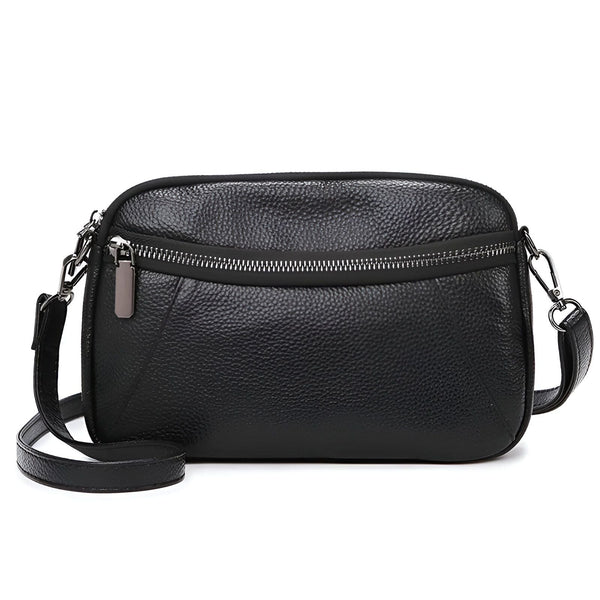 Sac noir en cuir grainé avec bandoulière et fermeture éclair sur le devant., 46264208556256,46264208589024