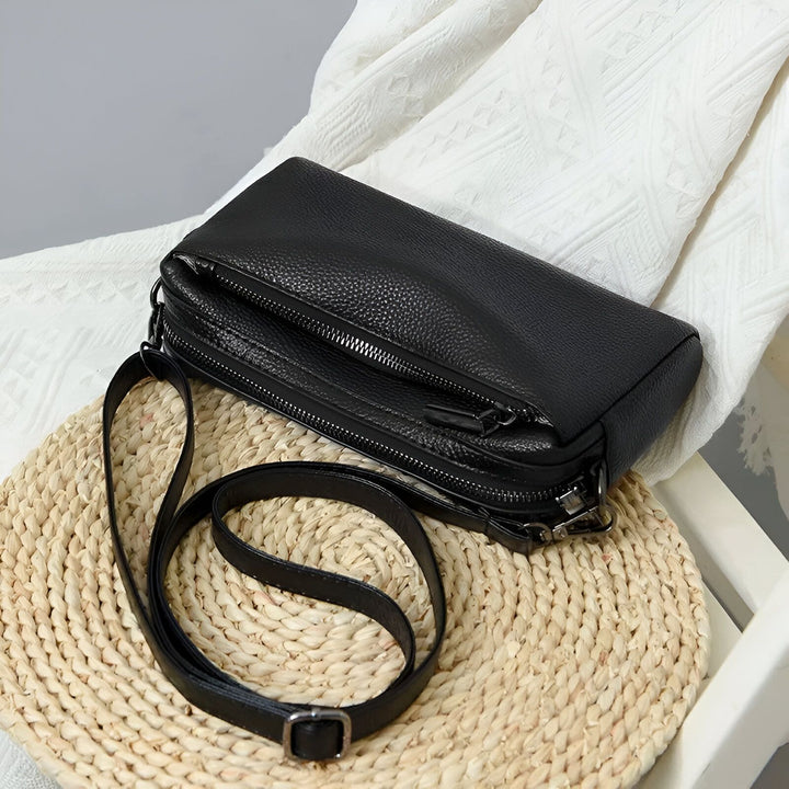 Sac bandoulière en cuir noir avec fermetures éclair sur surface tressée., 46266441760992,46266441793760