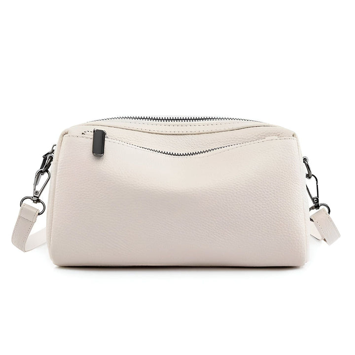 Sac à main beige clair en cuir texturé avec bandoulière et zip., 46266441760992,46266441793760