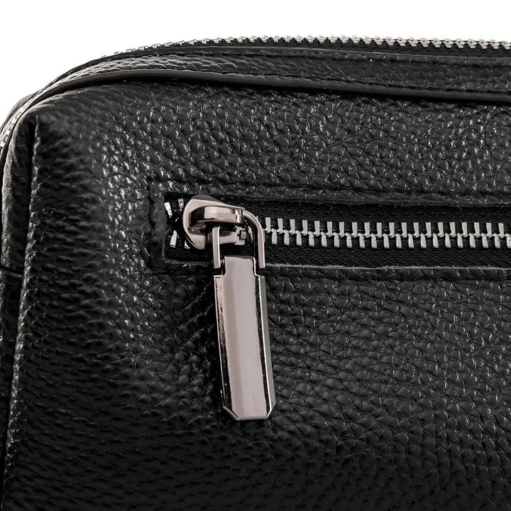 Gros plan : texture cuir noir, fermeture éclair et tirette métal., 46266441760992,46266441793760