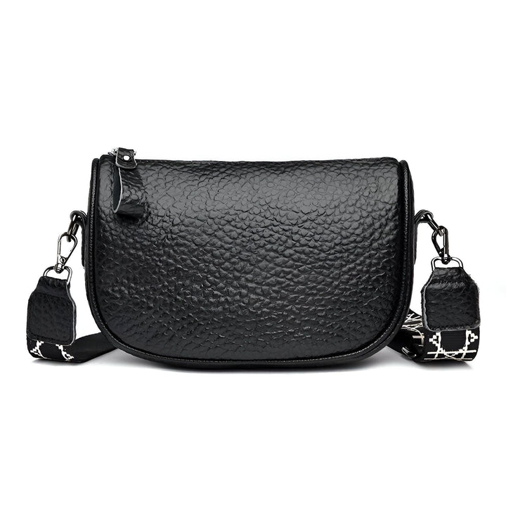 Sac bandoulière noir en cuir texturé avec sangle à motif blanc et noir., 46264208425184,46264208457952,46264208490720,46264208523488