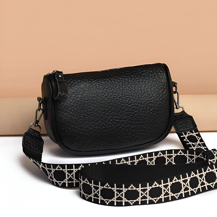Sac à main noir grainé avec large bandoulière motif noir et blanc., 46264208425184,46264208457952,46264208490720,46264208523488