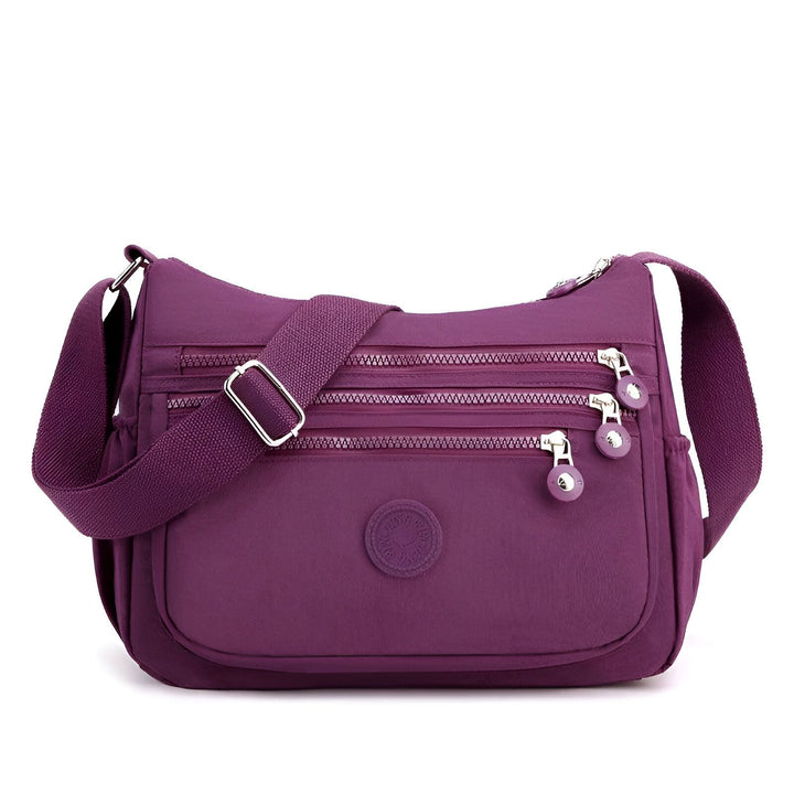 Sac bandoulière violet avec multiples poches zippées, 46262993518816,46262993551584,46262993584352,46262993617120,46262993649888,46262993682656,46262993715424,46262993748192,46262993780960,46262993813728,46262993846496,46262993879264,46262993912032,46262993944800,46262993977568,46262994010336,46262994043104,46262994075872,46262994108640,46262994141408,46262994174176,46262994206944,46262994239712,46262994272480