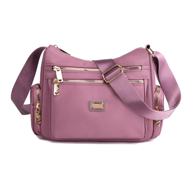Sac à bandoulière rose en tissu avec fermetures éclair dorées et multiples poches frontales., 46262993518816,46262993551584,46262993584352,46262993617120,46262993649888,46262993682656,46262993715424,46262993748192,46262993780960,46262993813728,46262993846496,46262993879264,46262993912032,46262993944800,46262993977568,46262994010336,46262994043104,46262994075872,46262994108640,46262994141408,46262994174176,46262994206944,46262994239712,46262994272480