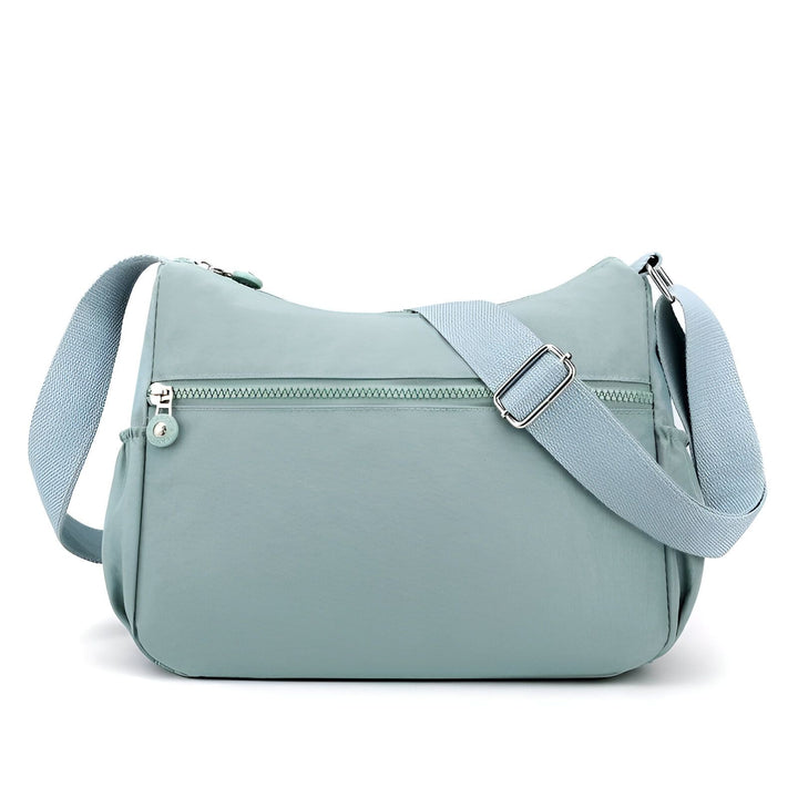 Sac bandoulière bleu-vert avec bandoulière et poches zippées., 46262993518816,46262993551584,46262993584352,46262993617120,46262993649888,46262993682656,46262993715424,46262993748192,46262993780960,46262993813728,46262993846496,46262993879264,46262993912032,46262993944800,46262993977568,46262994010336,46262994043104,46262994075872,46262994108640,46262994141408,46262994174176,46262994206944,46262994239712,46262994272480