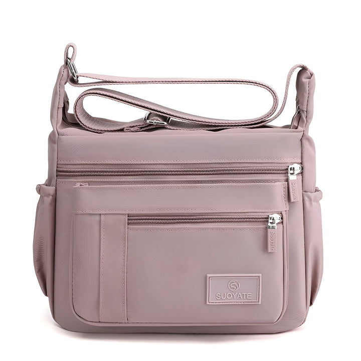 Sacoche bandoulière rose pâle SUOYATE avec poches zippées., 46262993518816,46262993551584,46262993584352,46262993617120,46262993649888,46262993682656,46262993715424,46262993748192,46262993780960,46262993813728,46262993846496,46262993879264,46262993912032,46262993944800,46262993977568,46262994010336,46262994043104,46262994075872,46262994108640,46262994141408,46262994174176,46262994206944,46262994239712,46262994272480