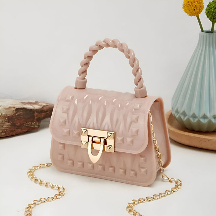 Sac à main rose pâle en silicone texturé avec anse torsadée et chaîne dorée., 46262992208096,46262992240864,46262992273632,46262992339168,46262992371936,46262992404704,46262992437472