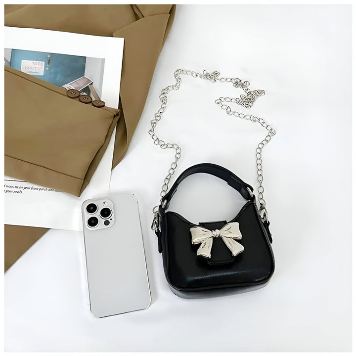 Sac à main noir miniature avec nœud argenté et chaîne., 46262992732384,46262992765152,46262992797920,46262992830688,46262992863456