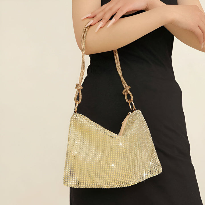 Sac baguette doré scintillant porté épaule., 46194028642528,46194028675296,46194028708064