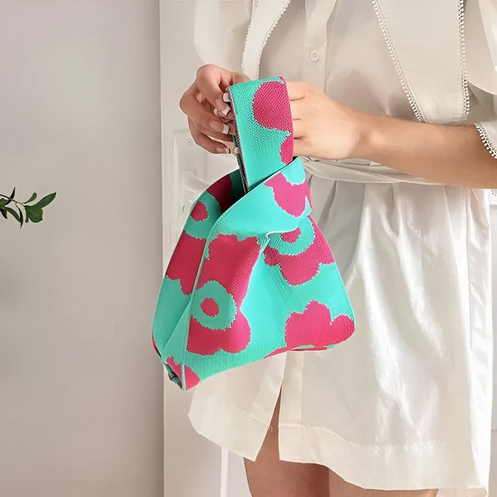 Petit sac à main turquoise et rose vif à motifs floraux abstraits, style noeud., 46193944363232,46193944396000,46193944428768