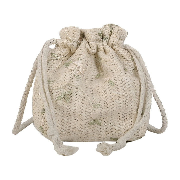 Petit sac beige tissé avec cordon de serrage et broderie florale délicate., 46193944494304,46193944527072,46193944559840