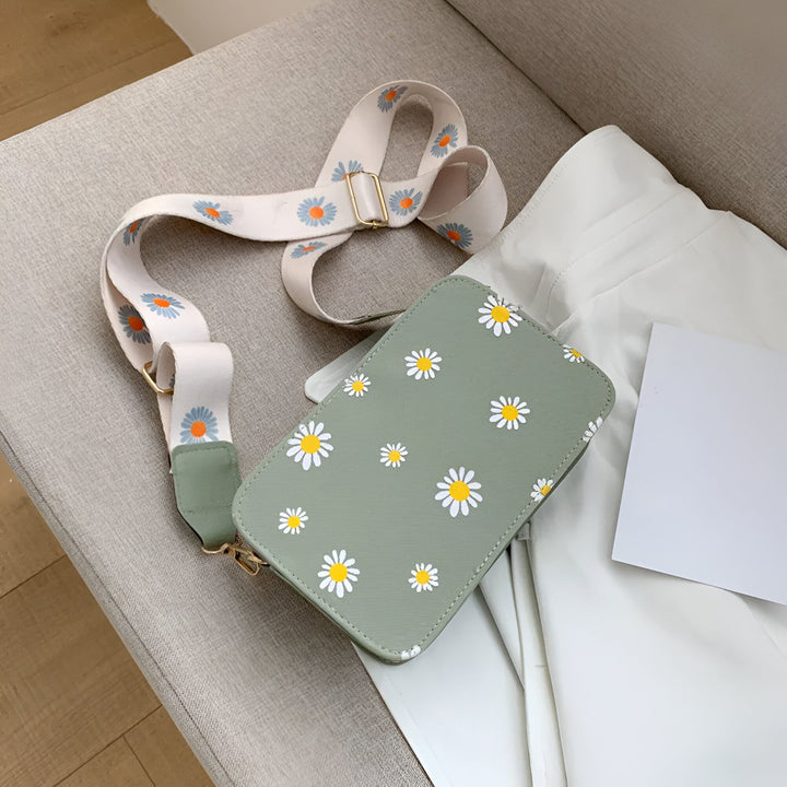 Sac vert clair imprimé marguerites avec bandoulière à fleurs., 46193876795616,46193876828384,46193876861152,46193876893920