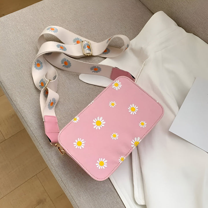 Sac bandoulière rose à motifs de marguerites et sangle blanche fleurie., 46193876795616,46193876828384,46193876861152,46193876893920