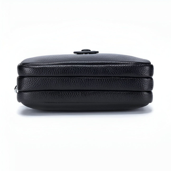 Vue latérale d'un sac noir en cuir grainé avec trois compartiments superposés, 46194062459104,46194062491872,46194062524640,46194062557408,46194062590176