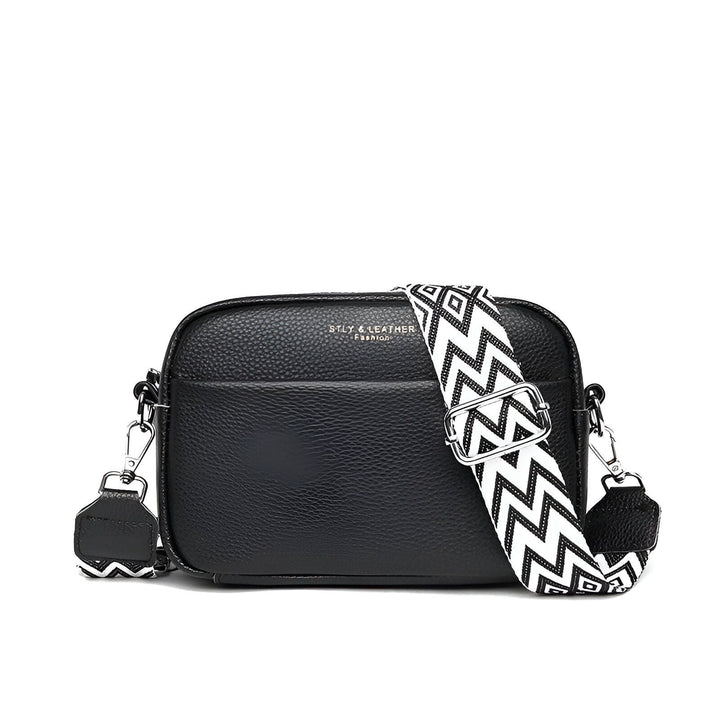 Sac à main noir en cuir avec large bandoulière noir et blanc à motif zigzag., 46194065080544,46194065113312,46194065146080,46194065211616,46194065244384