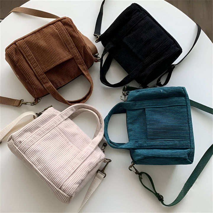 Quatre mini sacs en velours côtelé de différentes couleurs : marron, noir, rose pâle, bleu-vert., 46193960124640,46193960157408,46193960190176,46193960222944