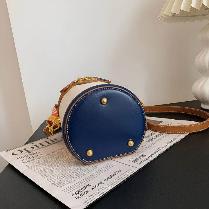Sac seau bicolore blanc et bleu marine, base avec pieds dorés., 46194010128608