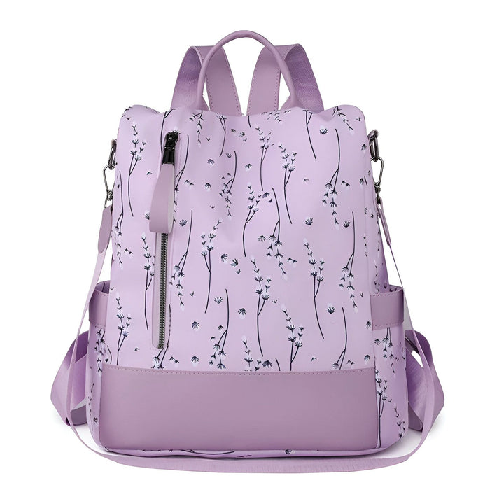 Sac à dos violet clair avec motif floral noir et blanc, poche zippée frontale et bretelles réglables., 46193997971680,46193998004448,46193998037216,46193998069984