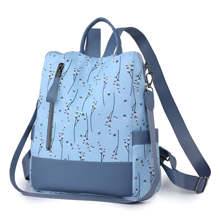 Sac à dos bleu ciel à motif floral blanc, base et bretelles grises., 46193997971680,46193998004448,46193998037216,46193998069984