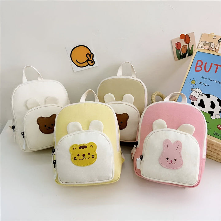 Quatre petits sacs à dos pour enfants (blanc, beige, jaune, rose) avec des visages d'animaux mignons., 46193975787744,46193975820512,46193975853280,46193975886048