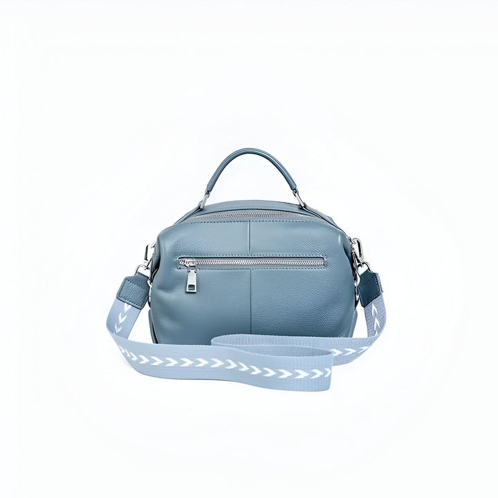 Sac à main en cuir bleu ciel avec poche zippée et bandoulière à motif amovible., 46193847599328,46193847632096,46193847664864,46193847697632,46193847730400