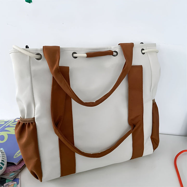 Sac fourre-tout blanc avec poignées et poches latérales marron., 46193874927840,46193874960608