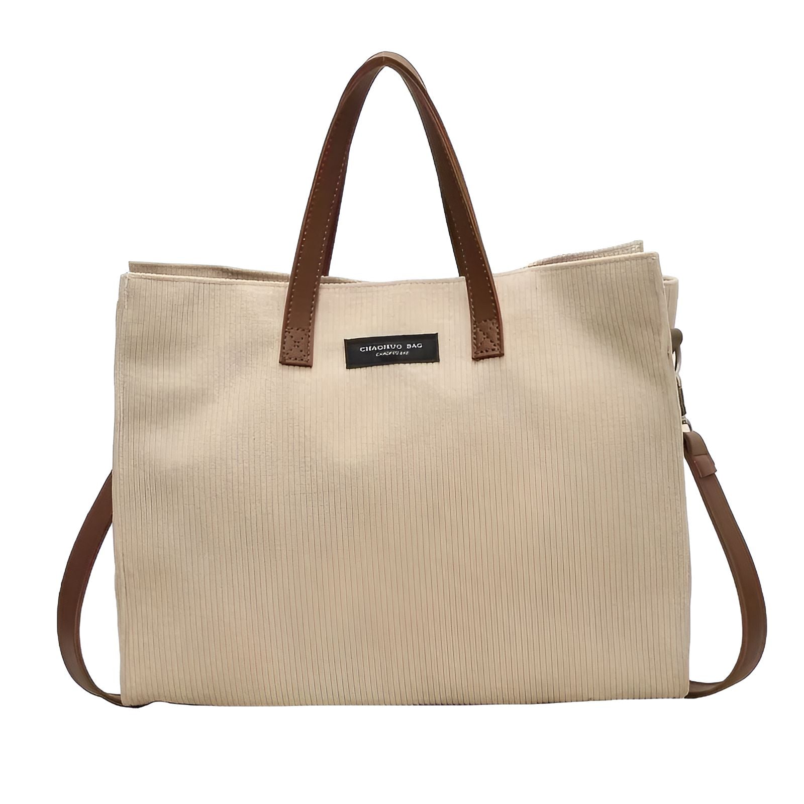 Sac à main beige en velours côtelé avec des anses en cuir marron.