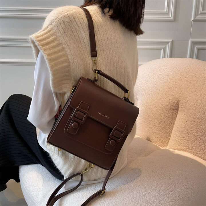 Sac cartable marron à boucles porté sur l'épaule, 46194003312864,46194003345632,46194003378400,46194003411168