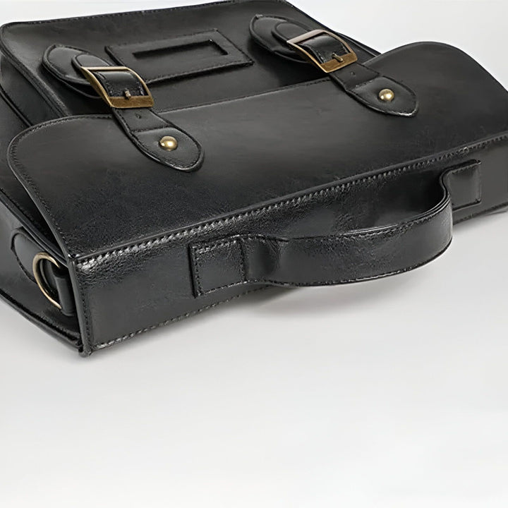 Sac en cuir noir avec poignée et boucles en métal doré., 46193905008864,46193905041632