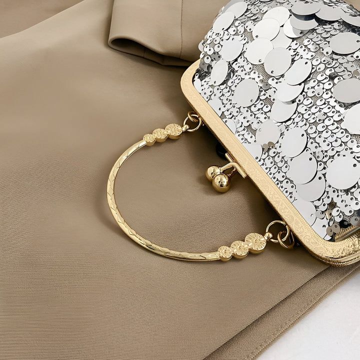 Pochette argentée à sequins avec cadre et poignée dorés, 46194028478688,46194028511456