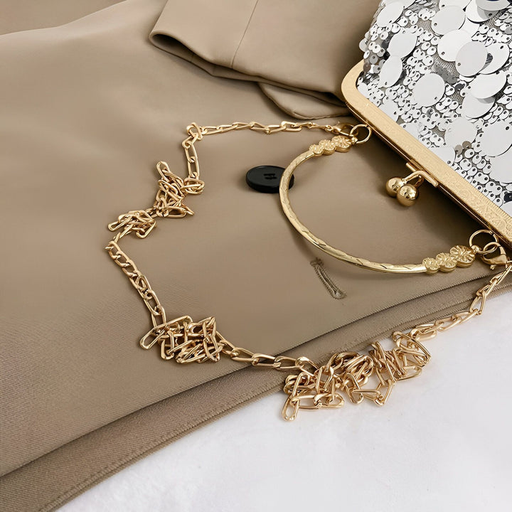Sac pochette blanc à sequins, chaînes et poignée rigide dorée à fleurs., 46194028478688,46194028511456