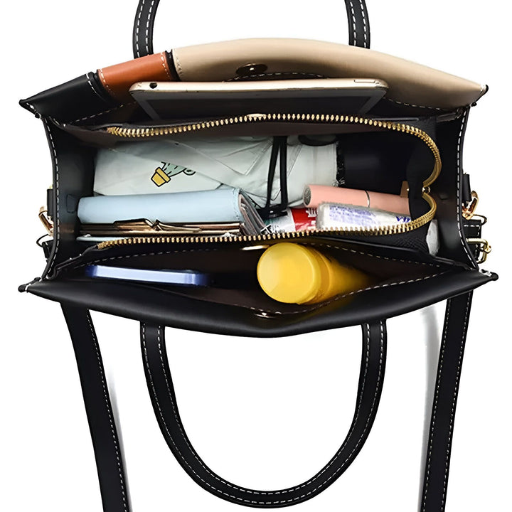 Intérieur d'un sac à main noir rempli d'objets, 46193873879264,46193873912032,46193873944800,46193873977568