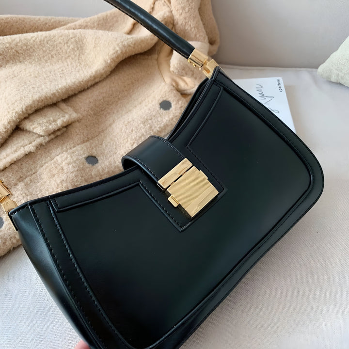 Sac à main en cuir noir avec fermoir doré, 46193936236768,46193936269536,46193936302304,46193936335072