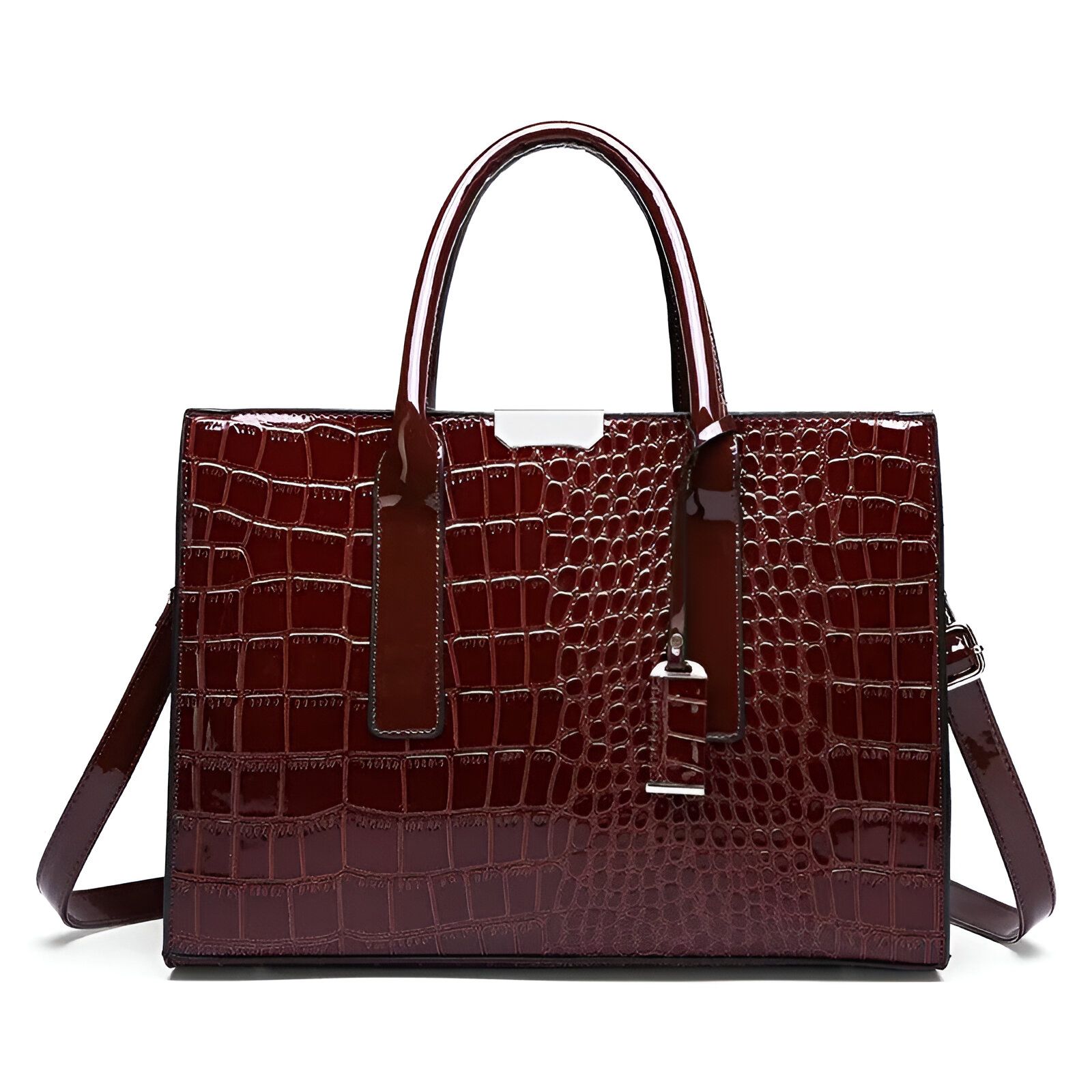 Sac à main en cuir marron foncé avec un motif de peau de crocodile.