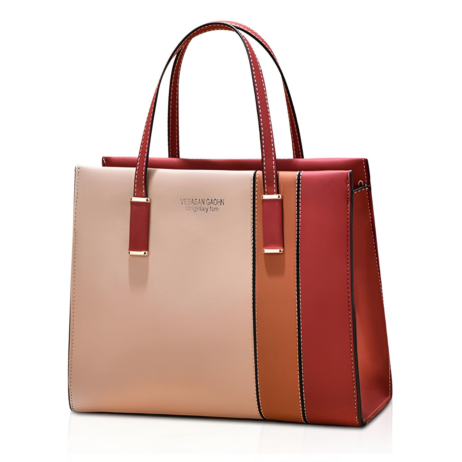 Sac à main en cuir de couleur beige, orange et rouge avec des poignées en cuir.