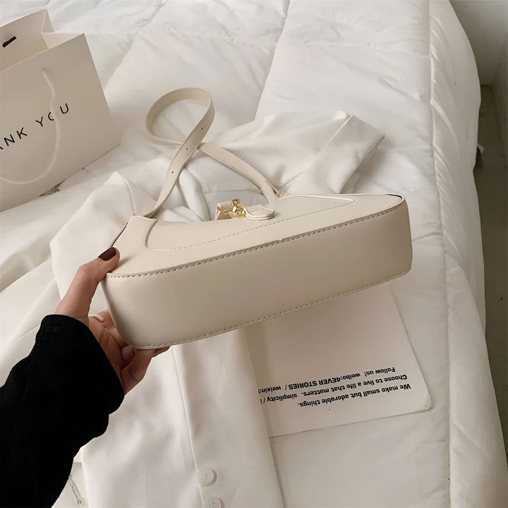 Sac à main crème porté épaule avec fermoir doré, 46193934565600,46193934598368,46193934631136,46193934663904,46193934696672