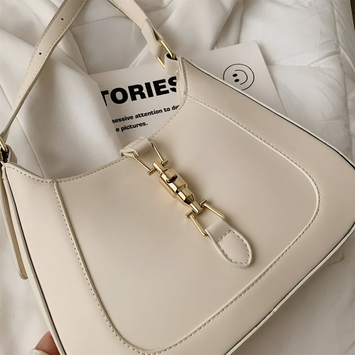 Sac à main crème avec fermoir doré, 46193934565600,46193934598368,46193934631136,46193934663904,46193934696672