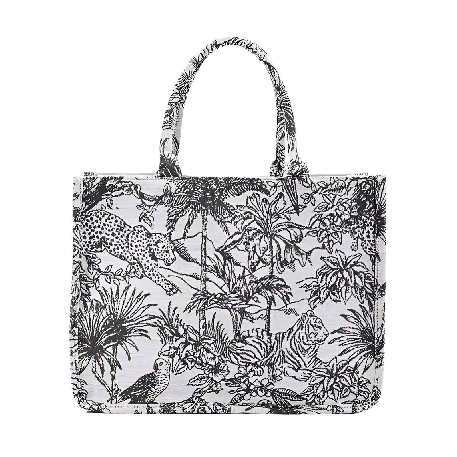 Un sac à main en toile blanche avec un motif noir de jungle, y compris des palmiers, des tigres et des léopards.